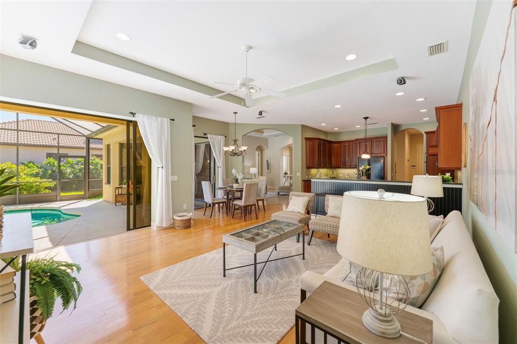 Chandelier, Dining room, Interior, Kitchen, Living room, Pendant Lights, Recessed Lighting, Wood Texture Flooring