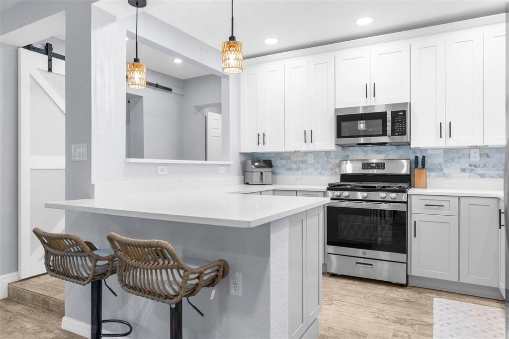 Interior, Kitchen, Pendant Lights, Recessed Lighting, Stainless Steel Appliances, Wood Texture Flooring