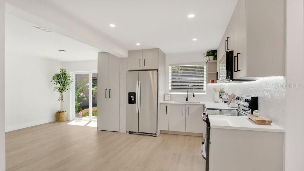 Interior, Kitchen, Recessed Lighting, Stainless Steel Appliances, Wood Texture Flooring