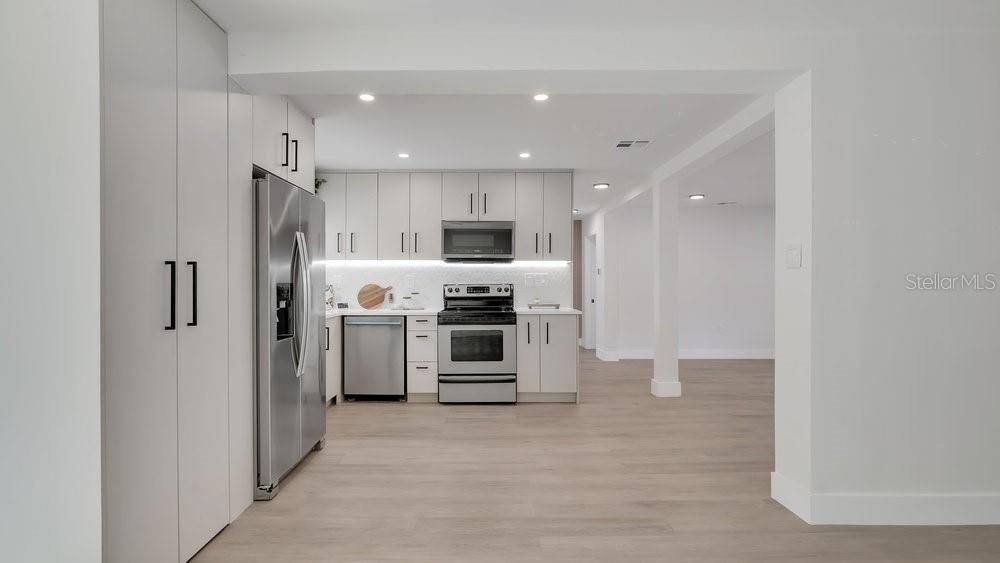 Interior, Kitchen, Recessed Lighting, Stainless Steel Appliances, Wood Texture Flooring