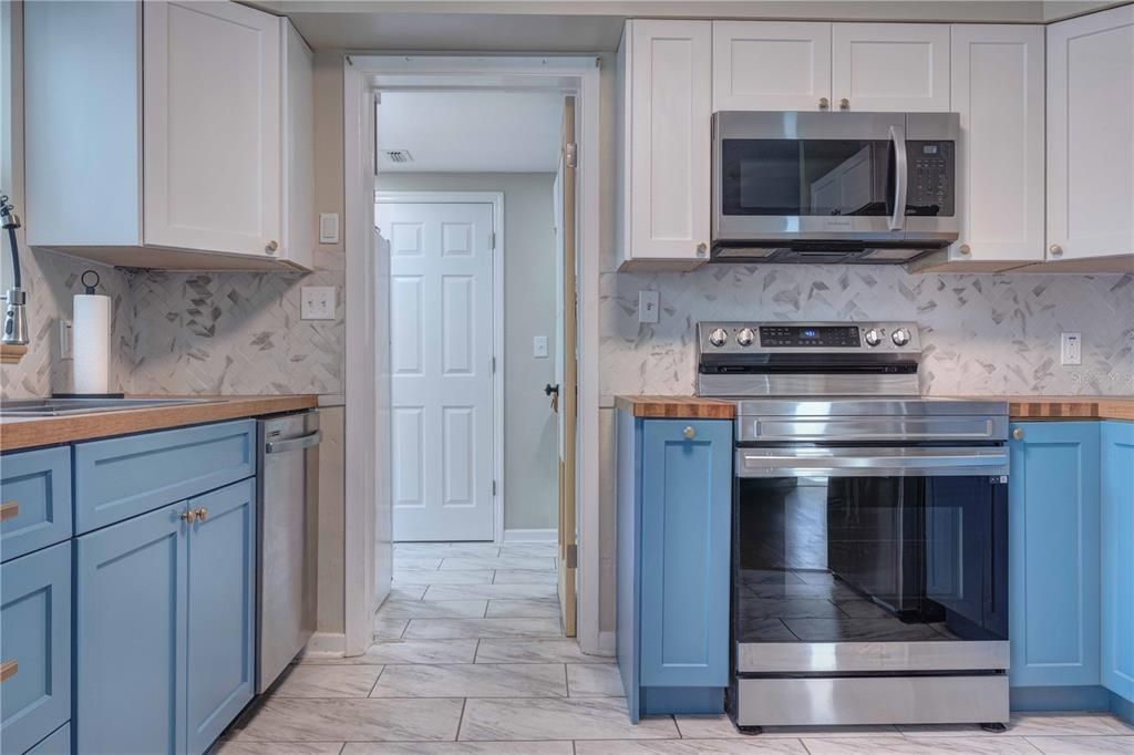 Interior, Kitchen, Marble, Marble Walls, Stainless Steel Appliances