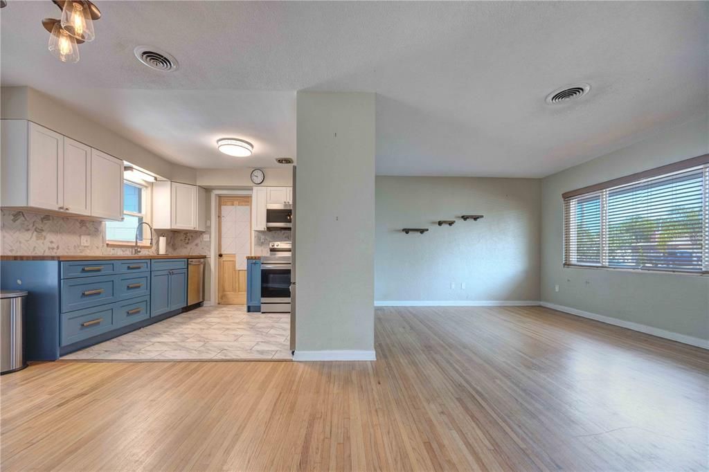 Empty room, Interior, Kitchen, Stainless Steel Appliances, Wood Texture Flooring