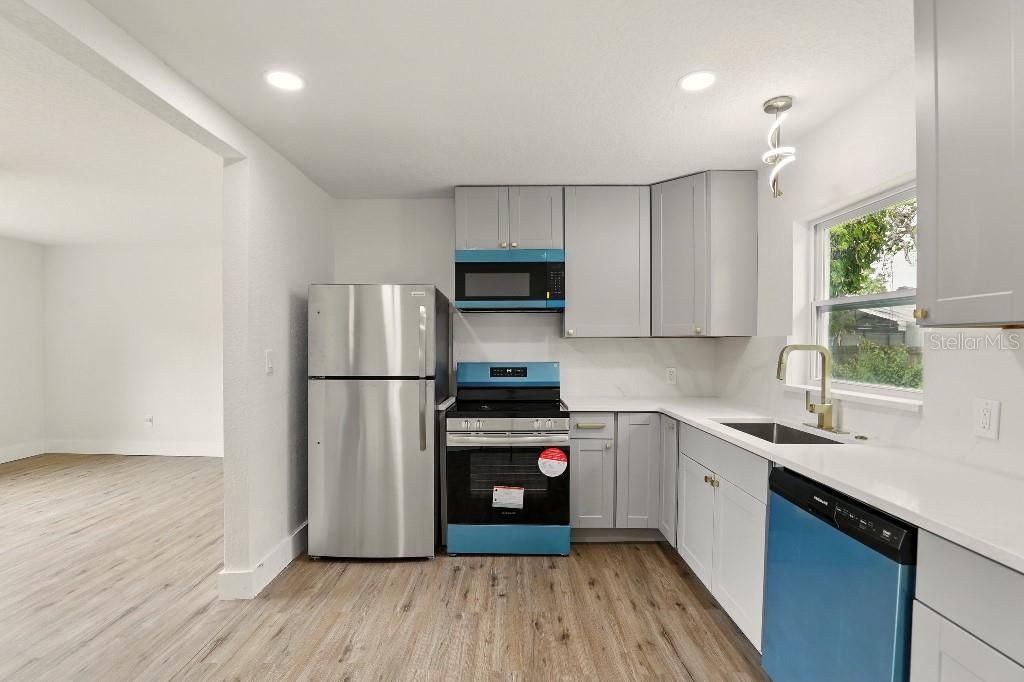 Interior, Kitchen, Pendant Lights, Recessed Lighting, Stainless Steel Appliances, Wood Texture Flooring