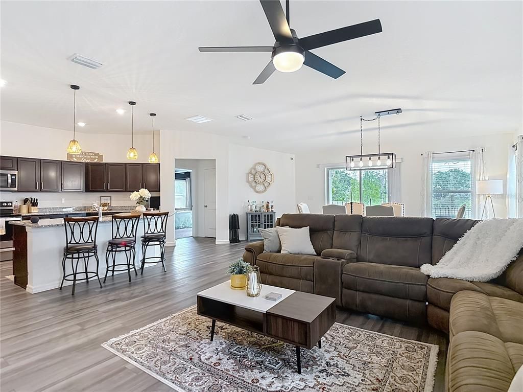 Dining room, Interior, Kitchen, Living room, Pendant Lights, Stainless Steel Appliances, Wood Texture Flooring