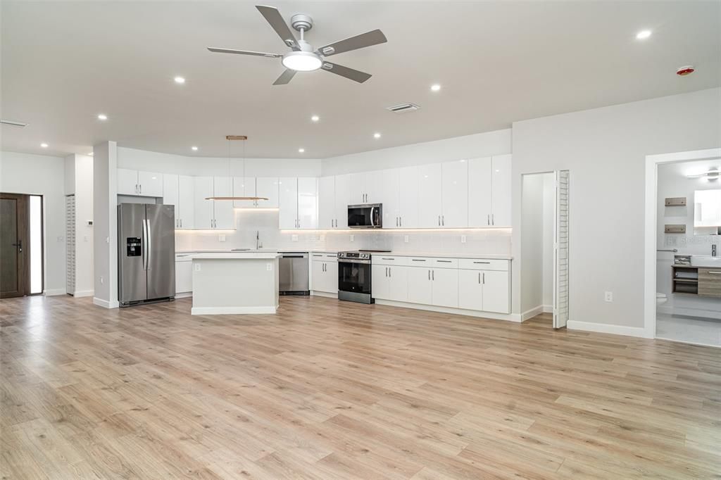 Interior, Kitchen, Pendant Lights, Recessed Lighting, Stainless Steel Appliances, Wood Texture Flooring
