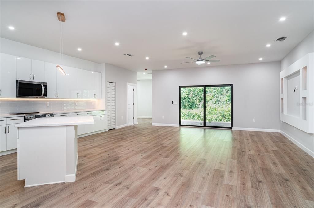 Empty room, Interior, Kitchen, Pendant Lights, Recessed Lighting, Wood Texture Flooring