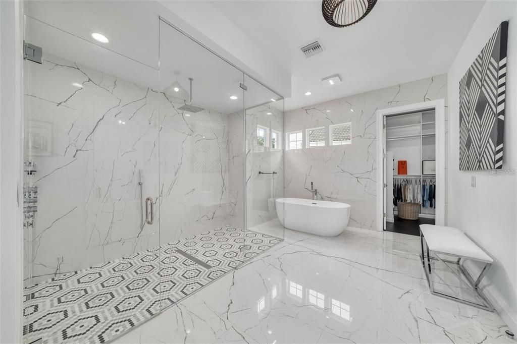 Bathroom, Free Standing Baths, Glass Shower, Interior, Marble, Marble Walls, Recessed Lighting
