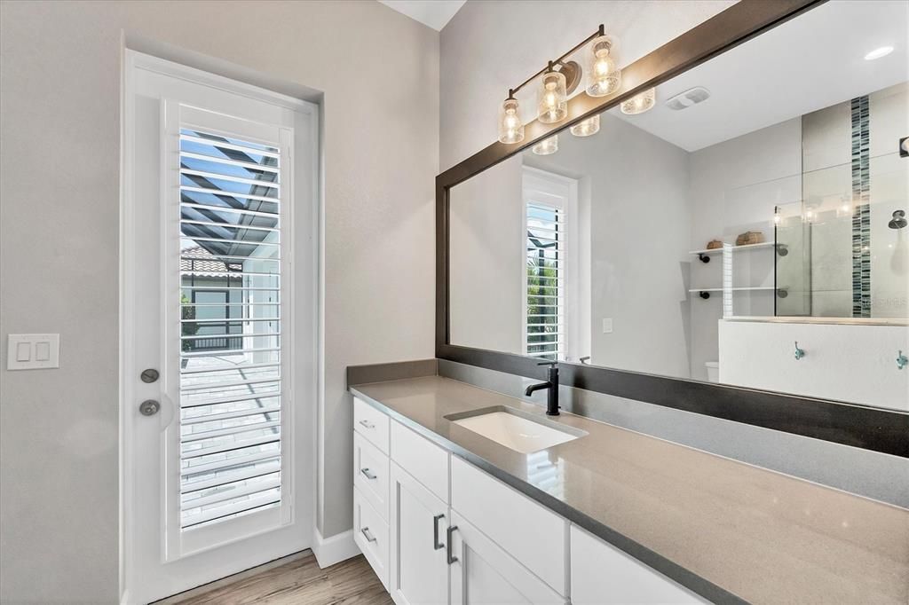 Bathroom, Dual Sink Vanities, Glass Shower, Interior, Recessed Lighting, Wood Texture Flooring