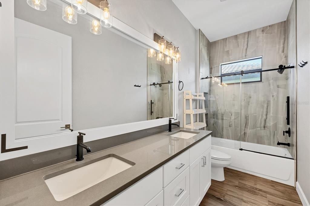 Bathroom, Dual Sink Vanities, Glass Shower, Interior, Wood Texture Flooring