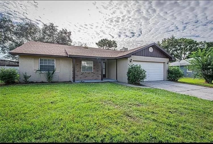 Attached, Backyard, Exterior, Facade, Brick Facade, Ranch
