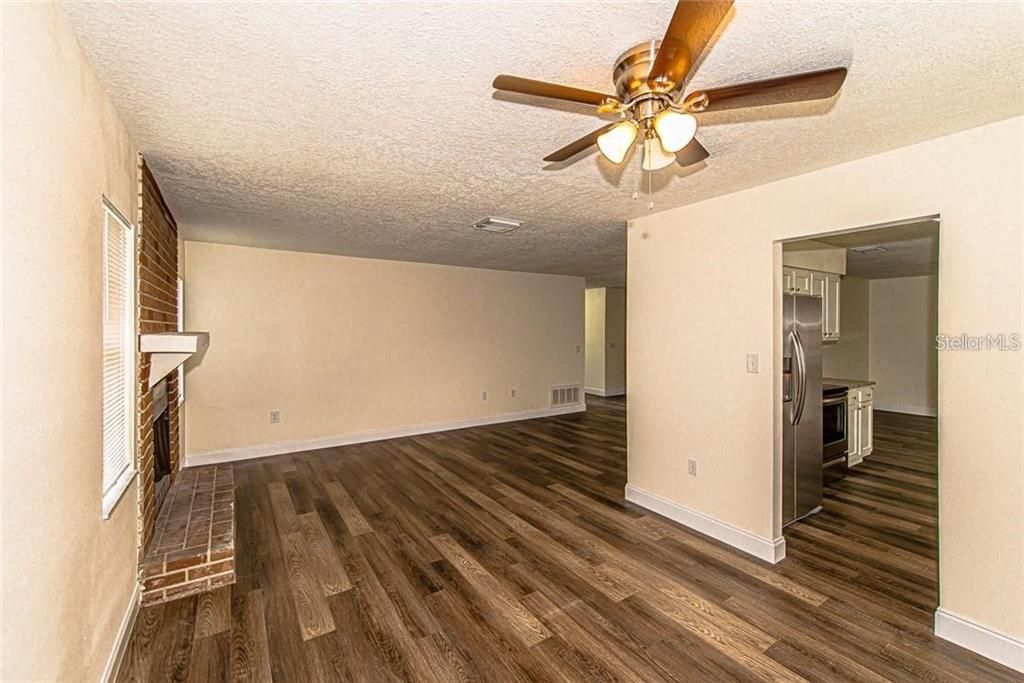 Empty room, Interior, Kitchen, Stainless Steel Appliances, Wood Texture Flooring