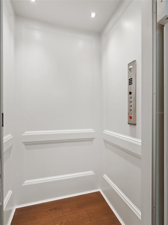 Elevator, Interior, Recessed Lighting, Wood Texture Flooring