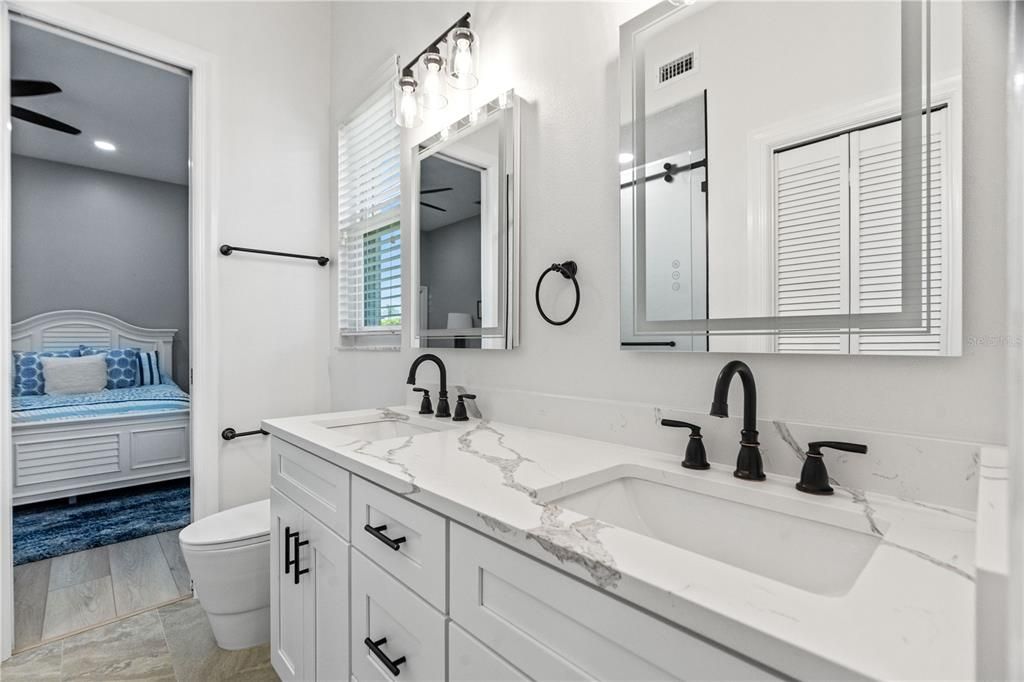 Bathroom, Dual Sink Vanities, Interior, Recessed Lighting, Wood Texture Flooring
