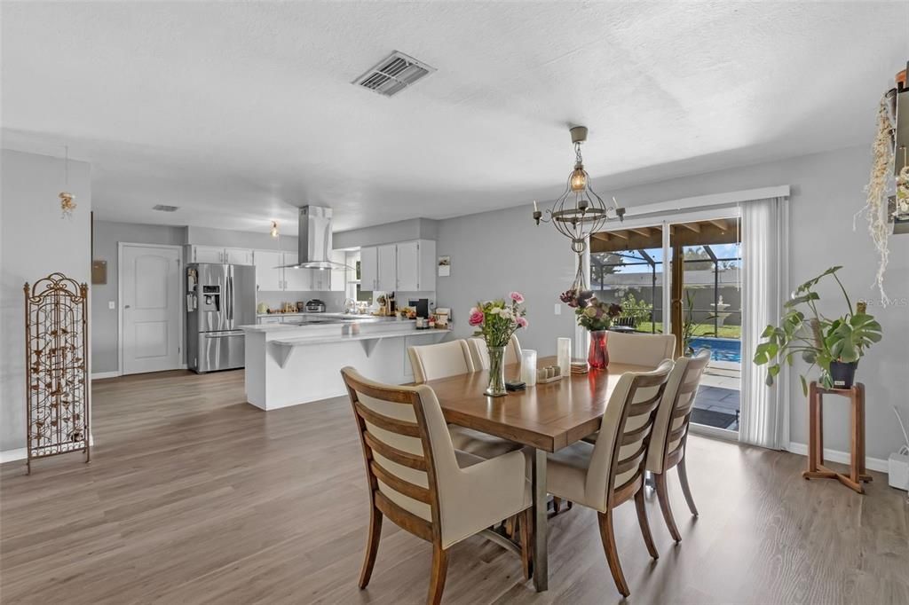 Dining room, Interior, Kitchen, Pendant Lights, Stainless Steel Appliances, Wood Texture Flooring