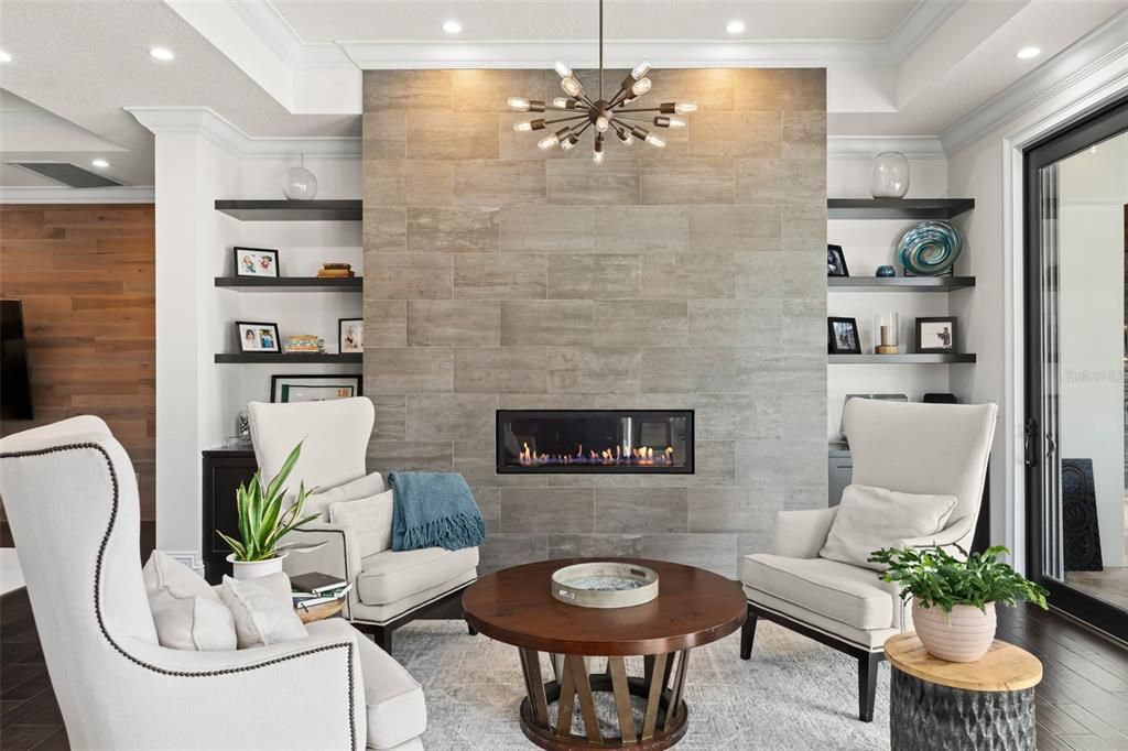Fireplace, Interior, Living room, Pendant Lights, Recessed Lighting, Stone Walls, Wood Texture Flooring, Wooden Walls