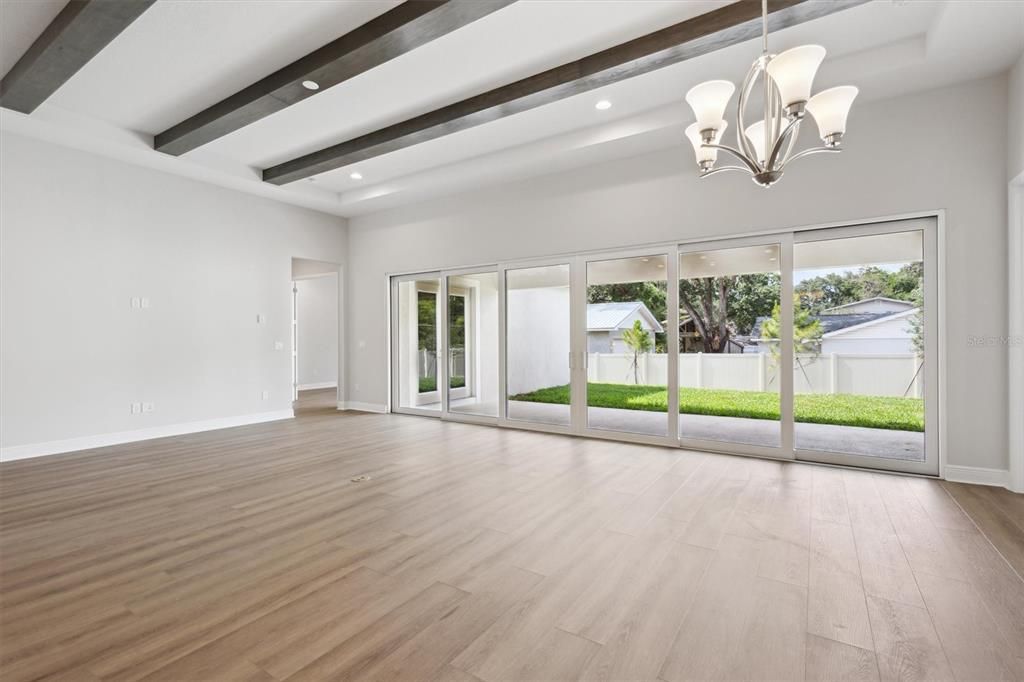 Chandelier, Empty room, Interior, Recessed Lighting, Wooden Beams, Wood Texture Flooring