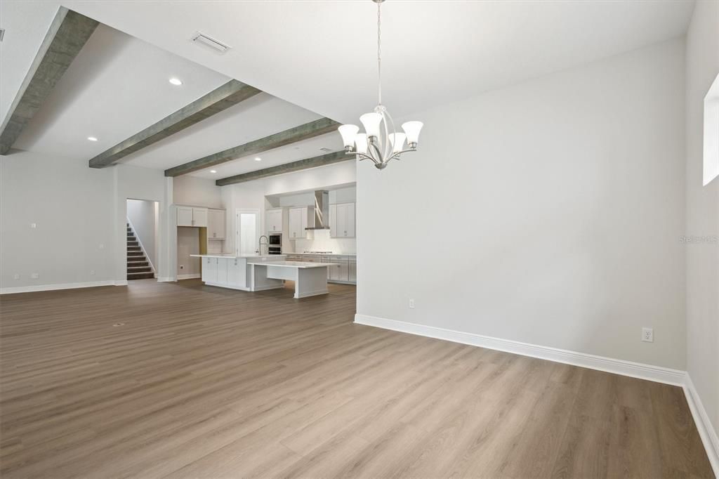 Chandelier, Empty room, Interior, Kitchen, Recessed Lighting, Wooden Beams, Wood Texture Flooring