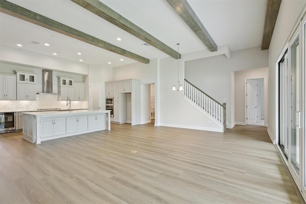 Empty room, Interior, Kitchen, Pendant Lights, Recessed Lighting, Wooden Beams, Wood Texture Flooring