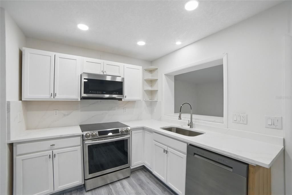Interior, Kitchen, Recessed Lighting, Stainless Steel Appliances, Wood Texture Flooring