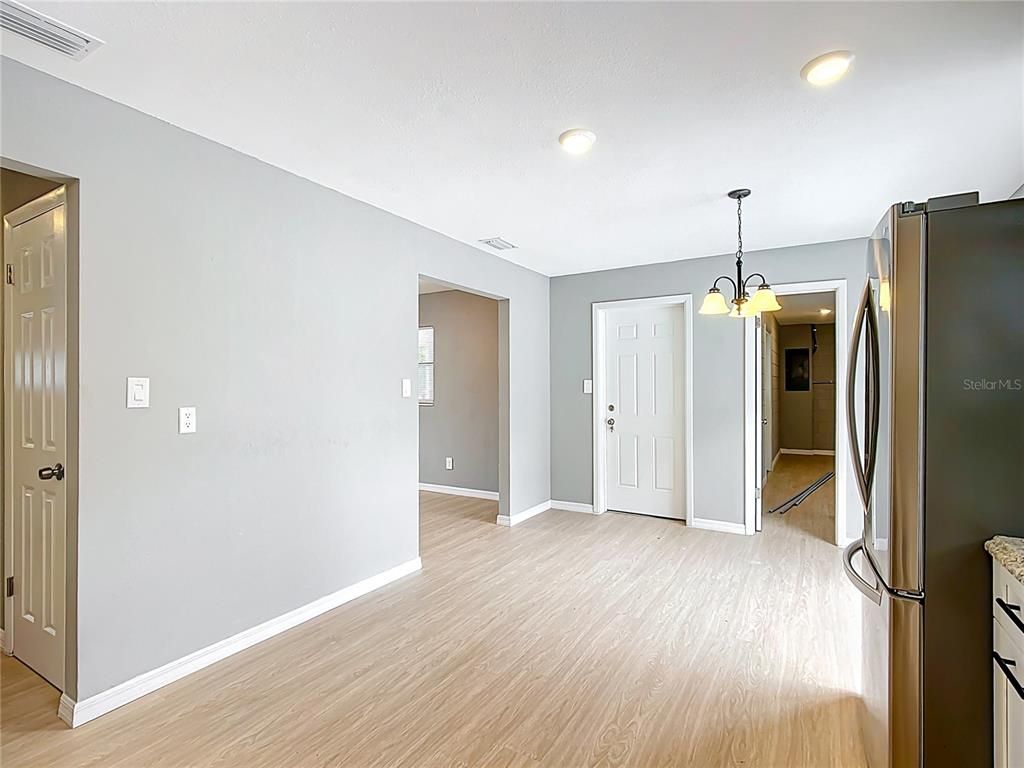 Empty room, Interior, Kitchen, Pendant Lights, Recessed Lighting, Wood Texture Flooring