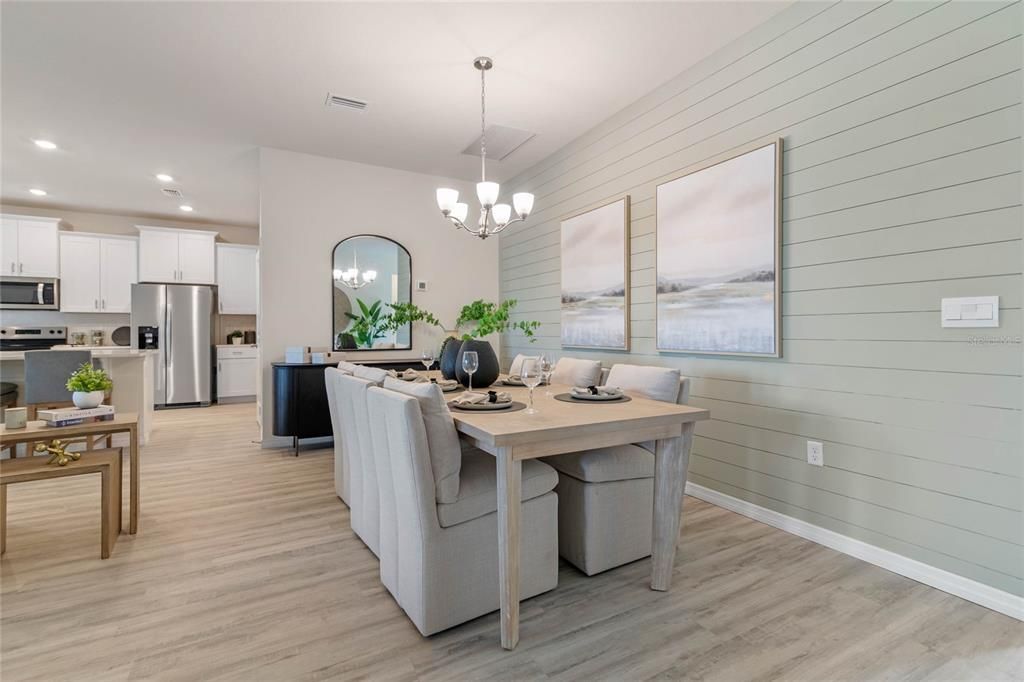 Chandelier, Dining room, Interior, Kitchen, Pendant Lights, Recessed Lighting, Stainless Steel Appliances, Wood Texture Flooring