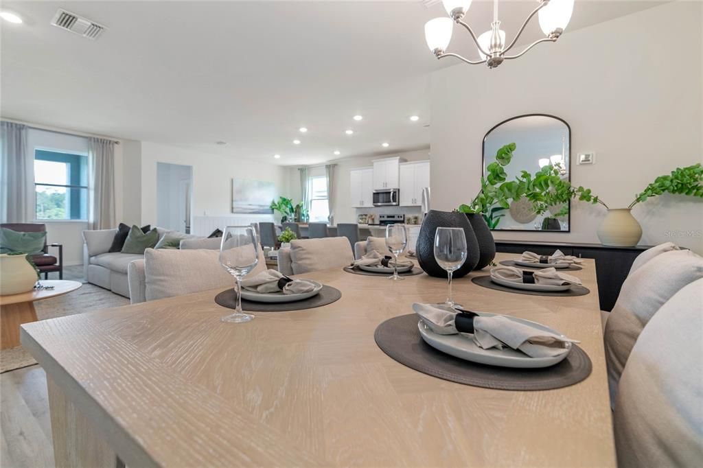 Chandelier, Dining room, Interior, Kitchen, Living room, Recessed Lighting, Stainless Steel Appliances, Wood Texture Flooring