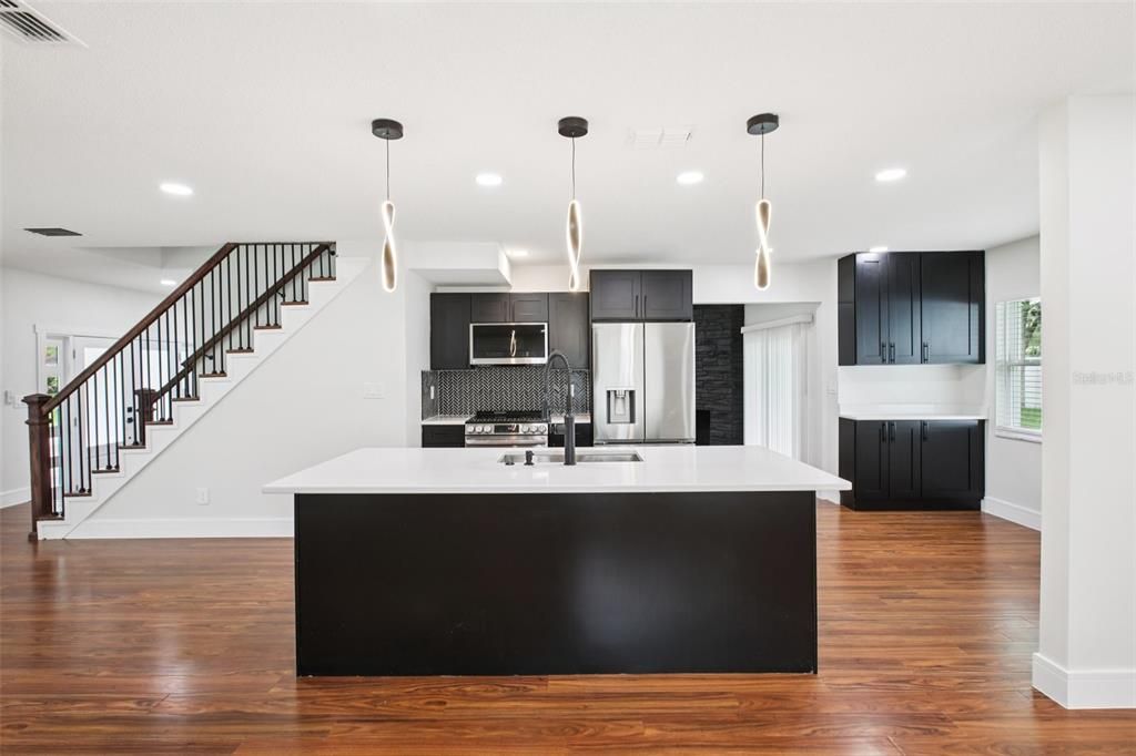 Interior, Kitchen, Pendant Lights, Recessed Lighting, Stainless Steel Appliances, Wood Texture Flooring