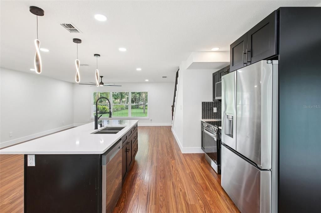 Interior, Kitchen, Pendant Lights, Recessed Lighting, Stainless Steel Appliances, Wood Texture Flooring