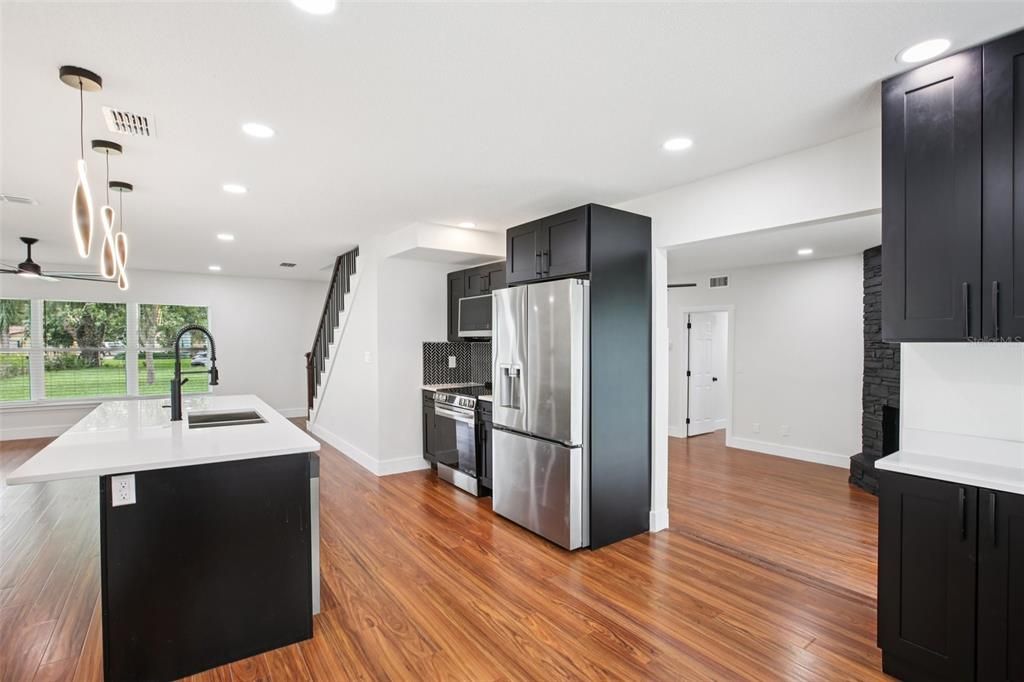 Interior, Kitchen, Pendant Lights, Recessed Lighting, Stainless Steel Appliances, Wood Texture Flooring