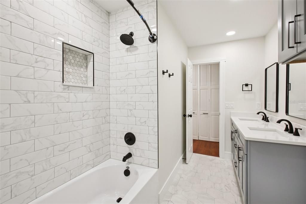 Bathroom, Dual Sink Vanities, Interior, Marble, Marble Walls, Recessed Lighting