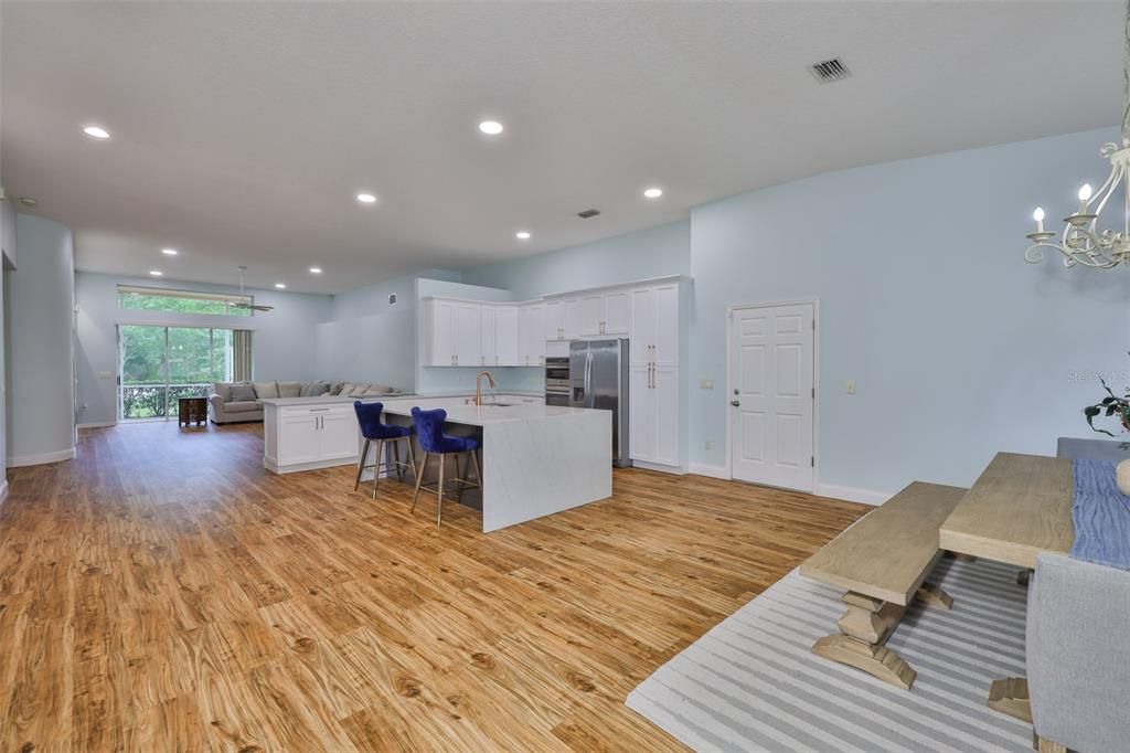 Dining room, Interior, Kitchen, Recessed Lighting, Stainless Steel Appliances, Wood Texture Flooring