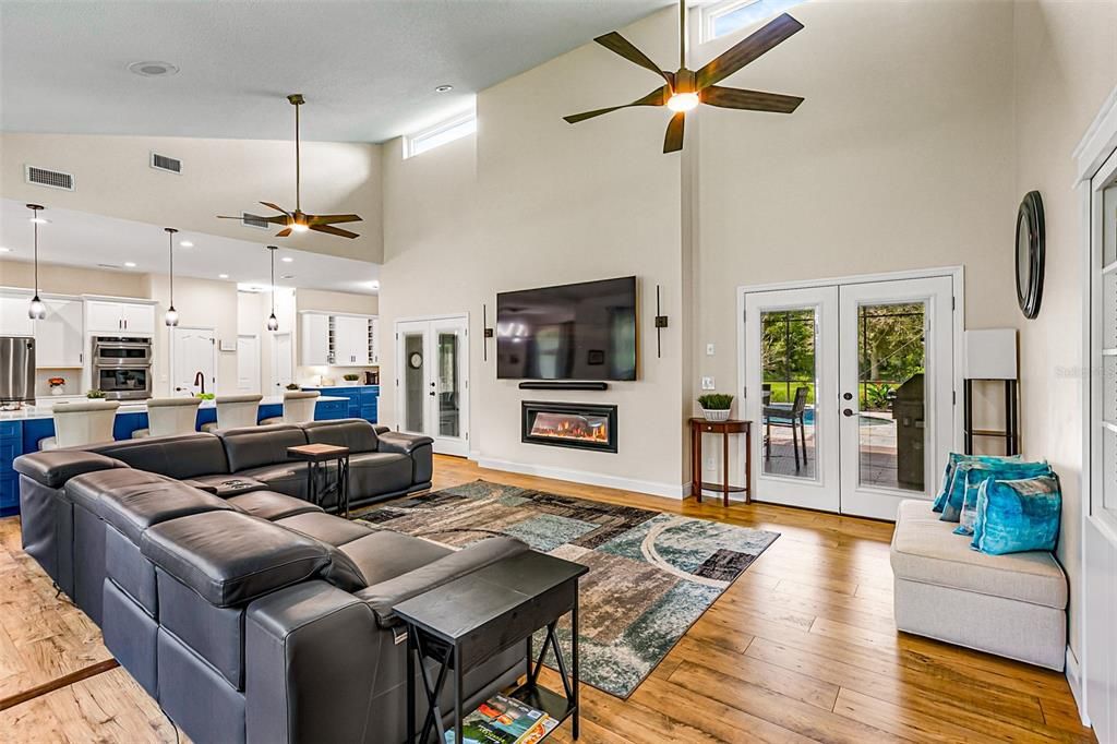 Fireplace, Interior, Kitchen, Living room, Pendant Lights, Recessed Lighting, Wood Texture Flooring