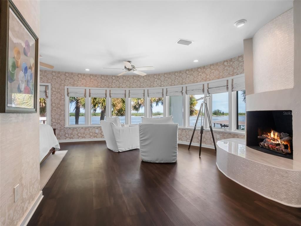 Fireplace, Interior, Living room, Recessed Lighting, Water, Wood Texture Flooring