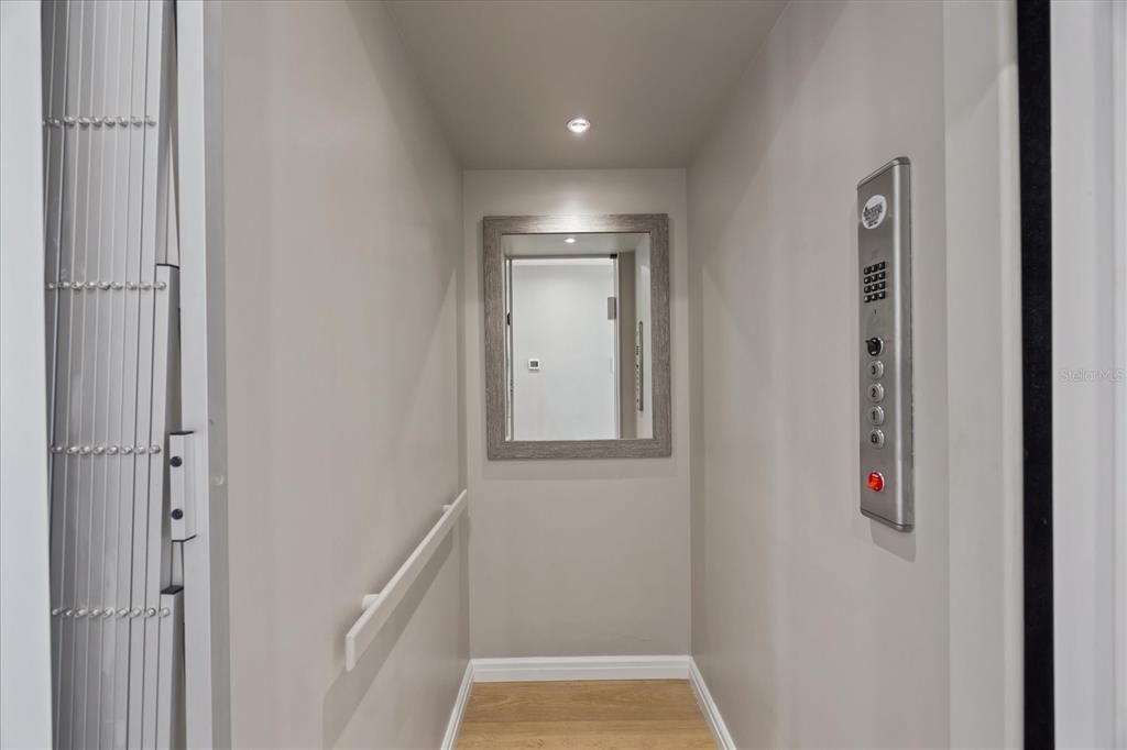 Elevator, Interior, Recessed Lighting, Wood Texture Flooring