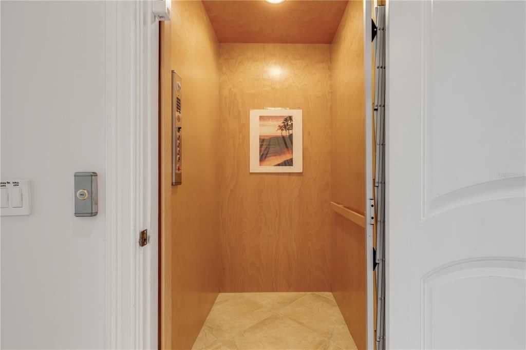 Elevator, Interior, Recessed Lighting, Wooden Ceilings, Wooden Walls