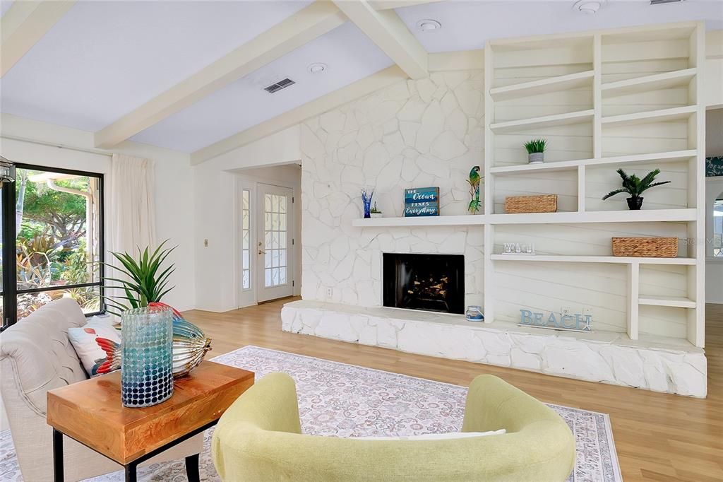 Fireplace, Interior, Living room, Recessed Lighting, Stone Walls, Wood Texture Flooring
