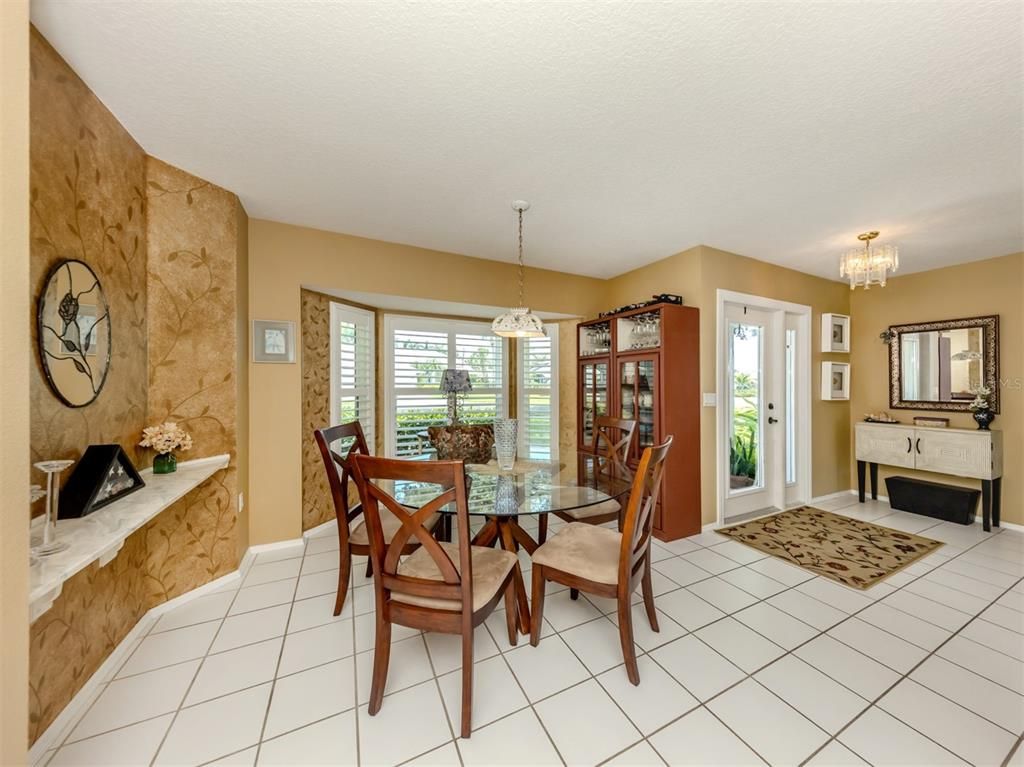 Chandelier, Dining room, Fireplace, Interior, Pendant Lights