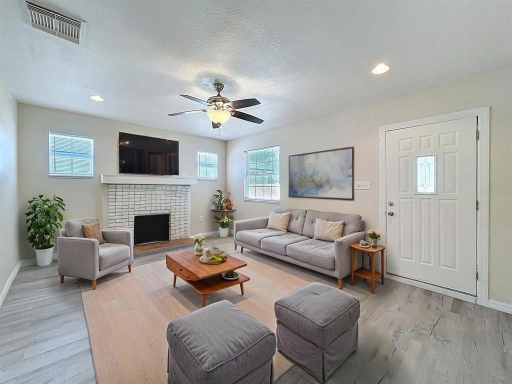 Fireplace, Interior, Living room, Recessed Lighting, Wood Texture Flooring