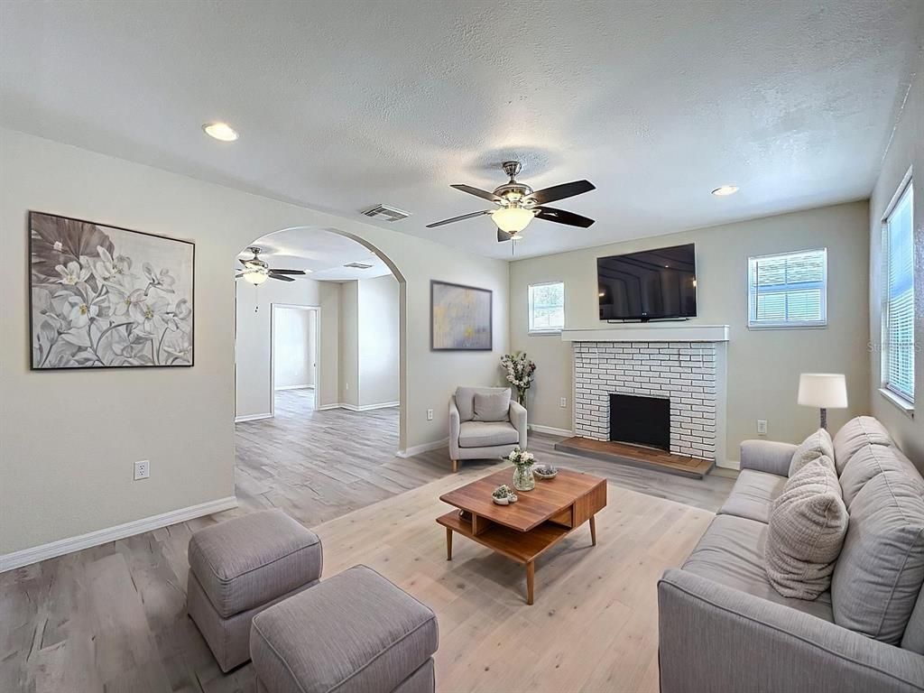 Fireplace, Interior, Living room, Recessed Lighting, Wood Texture Flooring