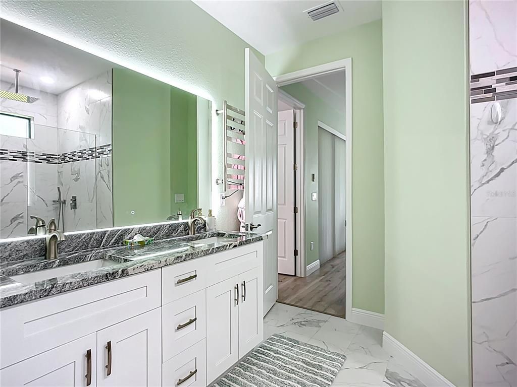 Bathroom, Dual Sink Vanities, Interior, Marble, Marble Walls, Wood Texture Flooring