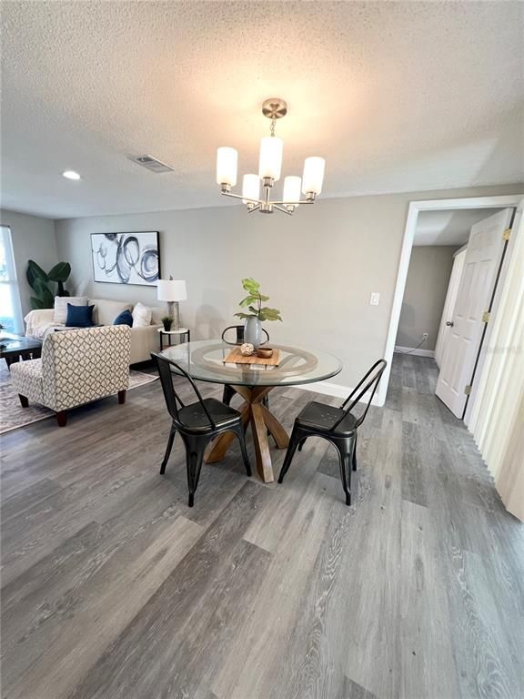 Bedroom, Chandelier, Dining room, Interior, Living room, Recessed Lighting, Wood Texture Flooring