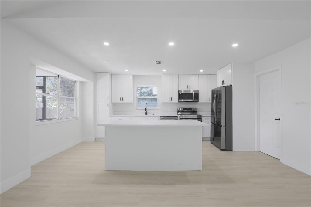 Interior, Kitchen, Recessed Lighting, Stainless Steel Appliances, Wood Texture Flooring