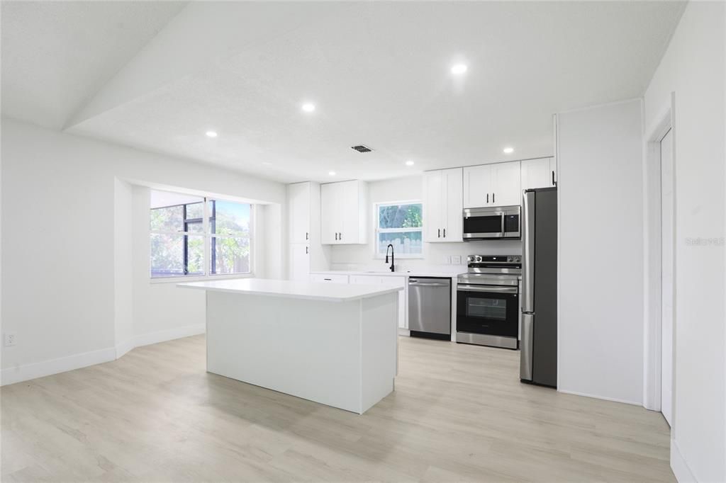 Interior, Kitchen, Recessed Lighting, Stainless Steel Appliances, Wood Texture Flooring