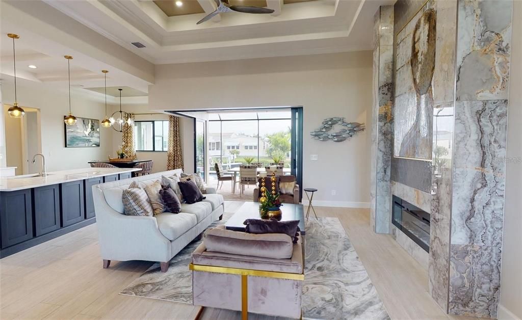 Dining room, Fireplace, Interior, Living room, Pendant Lights, Recessed Lighting, Wood Texture Flooring