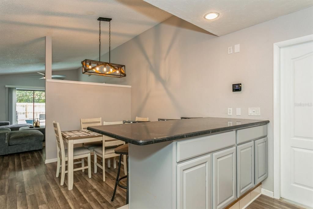 Dining room, Interior, Pendant Lights, Recessed Lighting, Wood Texture Flooring