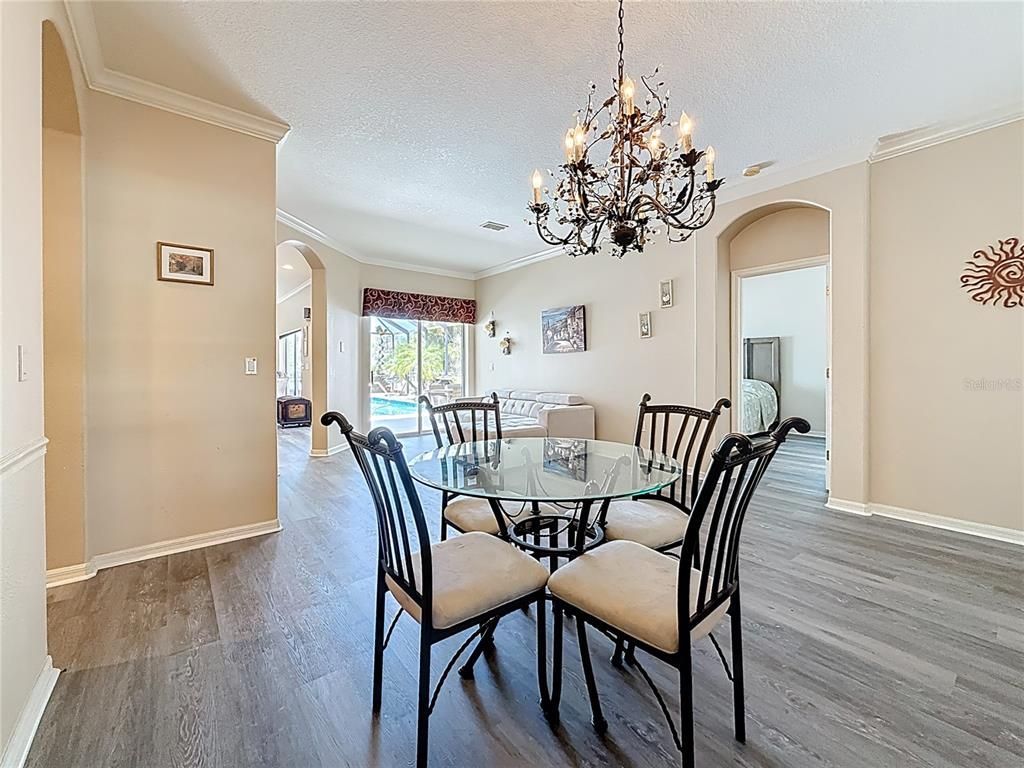 Chandelier, Dining room, Interior, Wood Texture Flooring