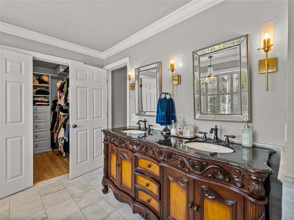 Bathroom, Chandelier, Dual Sink Vanities, Interior, Wood Texture Flooring