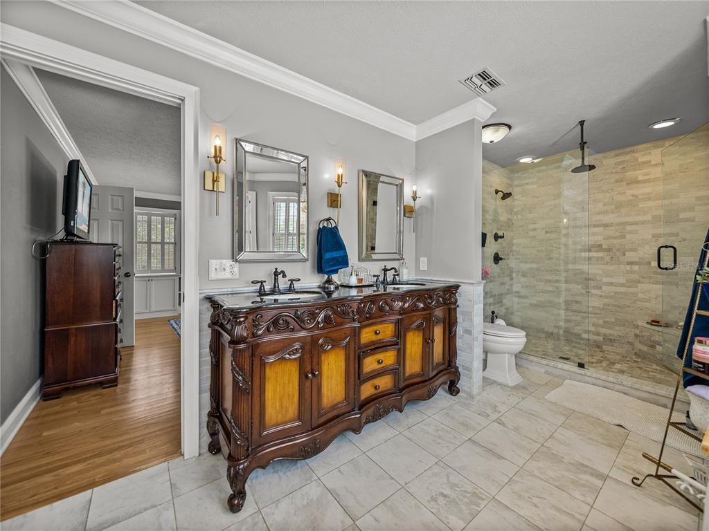 Bathroom, Dual Sink Vanities, Glass Shower, Interior, Recessed Lighting, Wood Texture Flooring