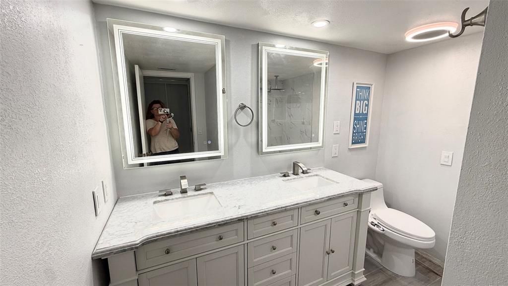 Bathroom, Dual Sink Vanities, Interior, Recessed Lighting, Wood Texture Flooring