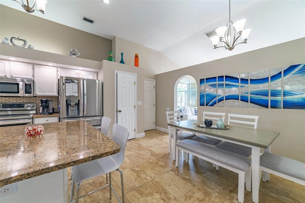 Chandelier, Dining room, Interior, Kitchen, Pendant Lights, Recessed Lighting, Stainless Steel Appliances